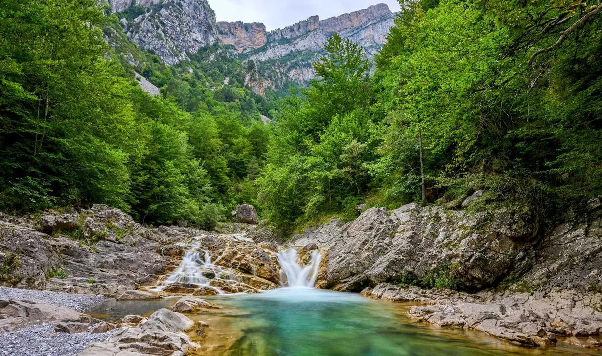 Cascading waters in A&ntilde;isclo Canyon. | Dreamstime