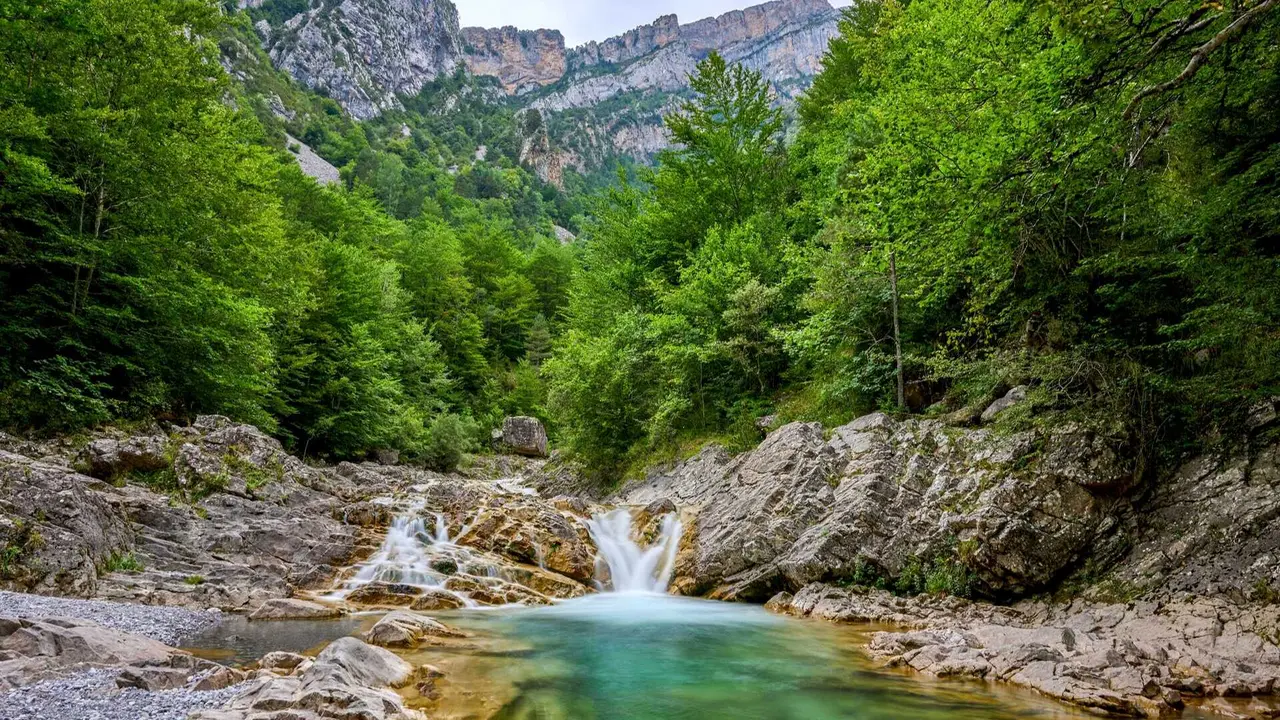 Cascading waters in A&ntilde;isclo Canyon. | Dreamstime
