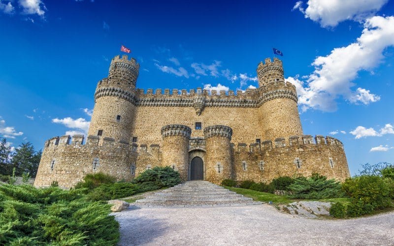 The front view of a castle from a low angle 