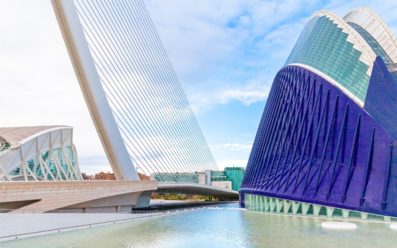 A bridge and a modern blue building