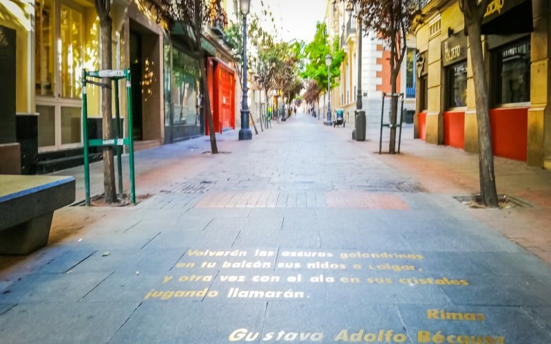 A street with poems on the pavement
