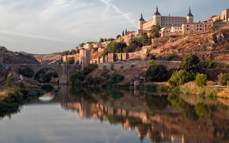 An old city and a bridge over a river