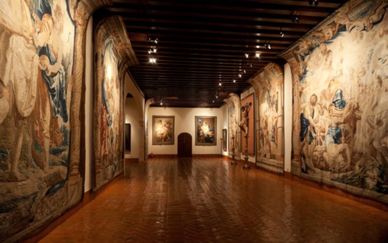 A room with beautiful tapestries