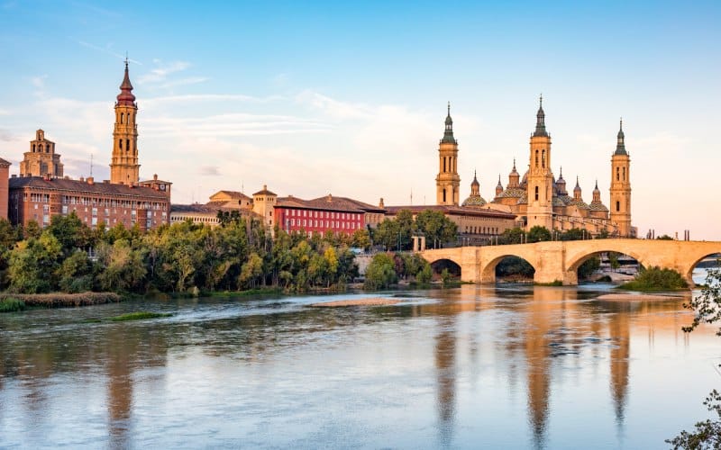 A city with towers and a bridge over the river