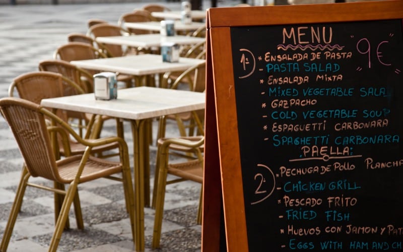 It is common to see a menú del día written on a chalkboard outside a restaurant