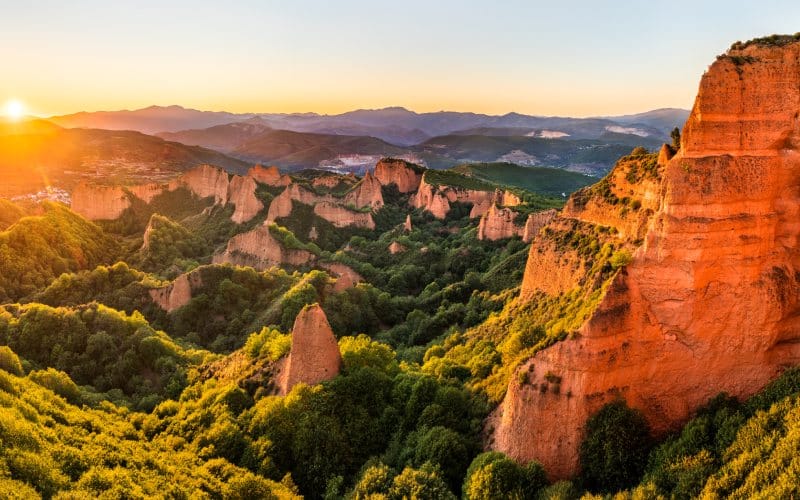 The sun sets over the unique landscape of Las Médulas