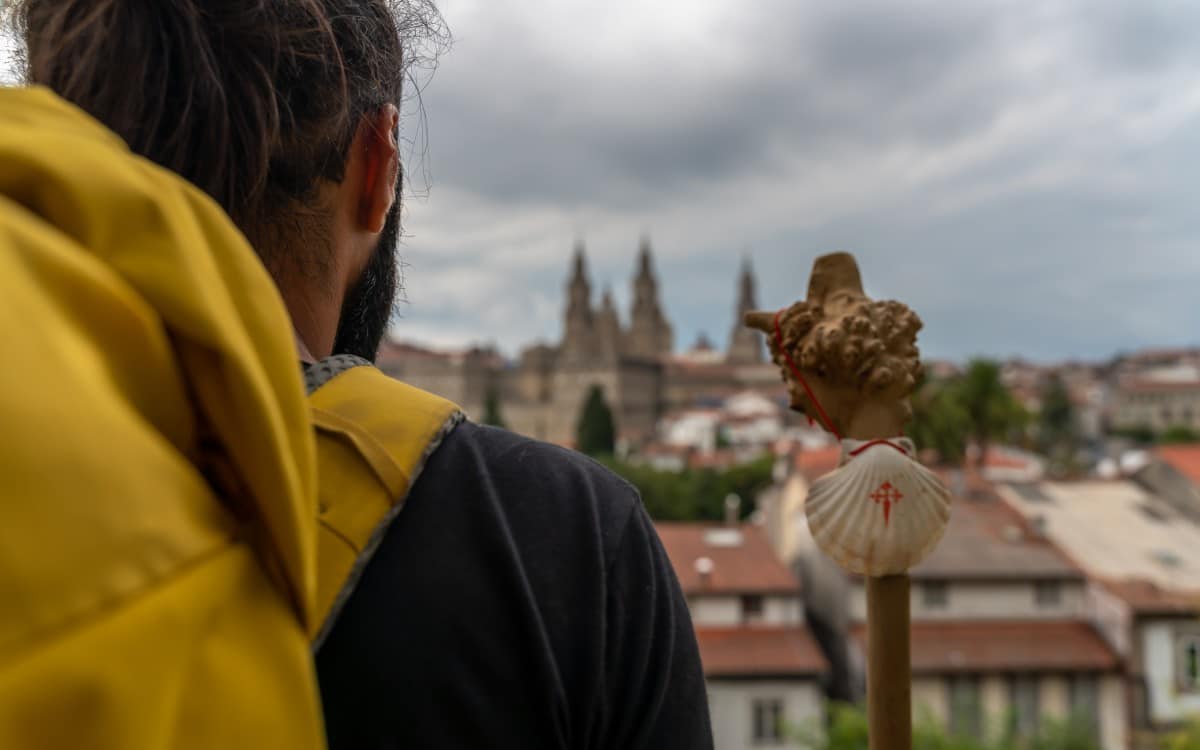 A pilgrim arrives at Santiago de Compostela